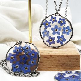 Irregular shape blue forget me not resin dry pressed flower necklace